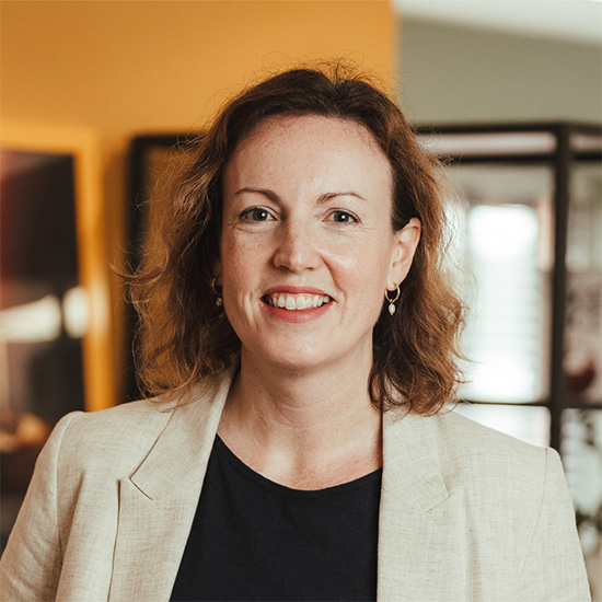 Photo of Clare Pope, Head of Clients and Content at Sharp in full colour.